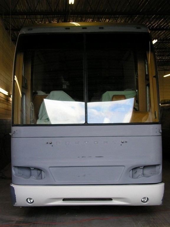 Prevost H3-45 Marathon Front upgrade in process by Excalibur Coach