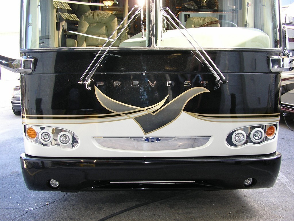 99 Prevost H3-45 with Updated Front and New Graphics by Excalibur Coach
