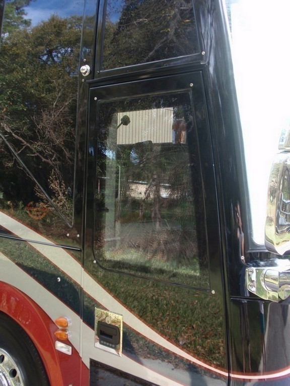 Prevost H3-45 New style entry door window updated by Excalibur Coach