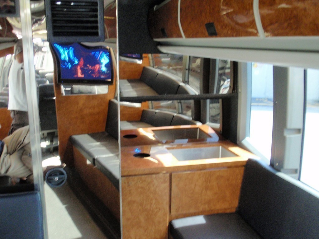 Prevost H3 Rear Lounge with added trash container and ice sink with drain by Excalibur