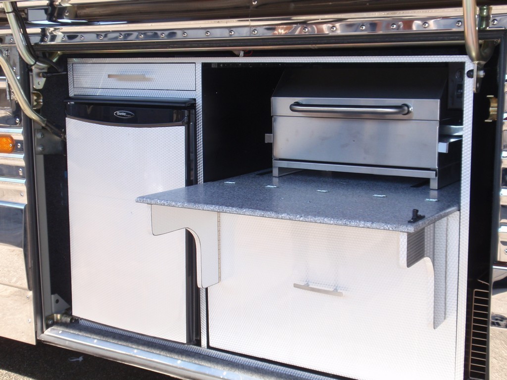 Prevost Bay 3 Flip down storage with Corian top designed by Excalibur Coach Prevost Motorhome XL XLII H3