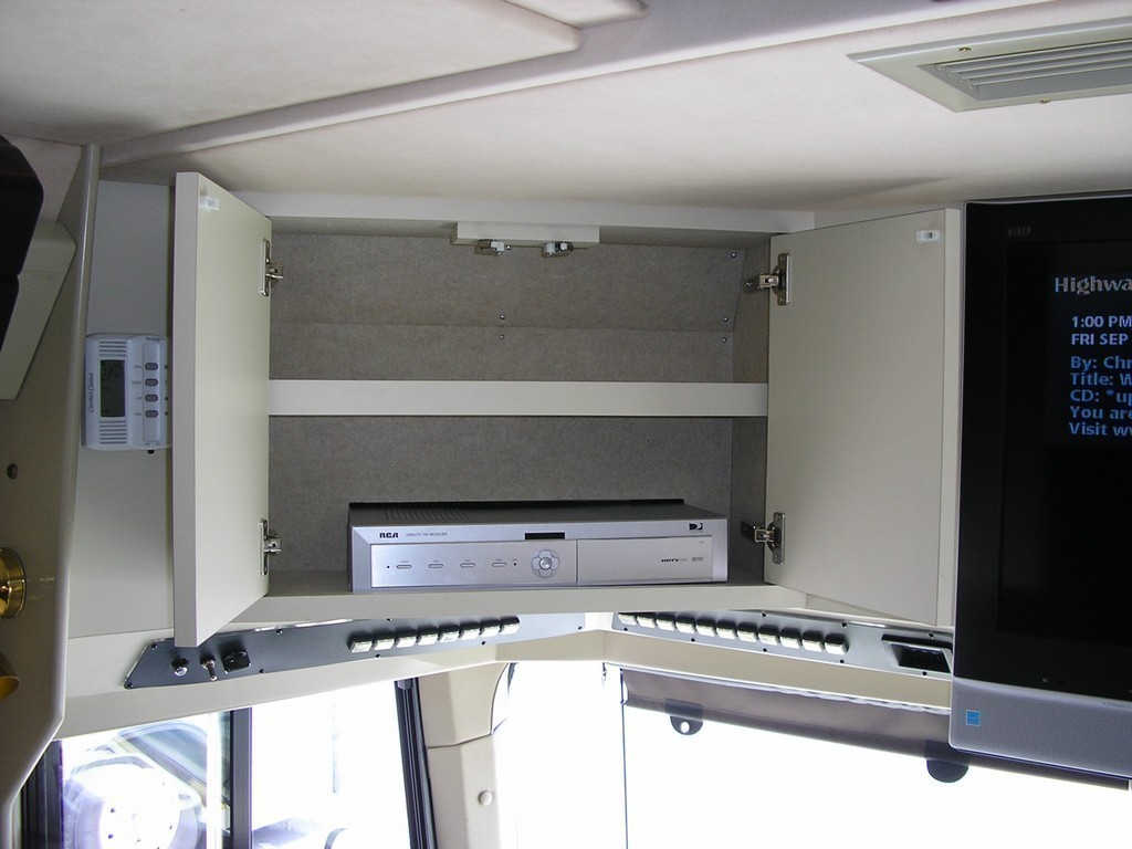 1997 Country Coach Drivers side custom cabinets by Excalibur Coach