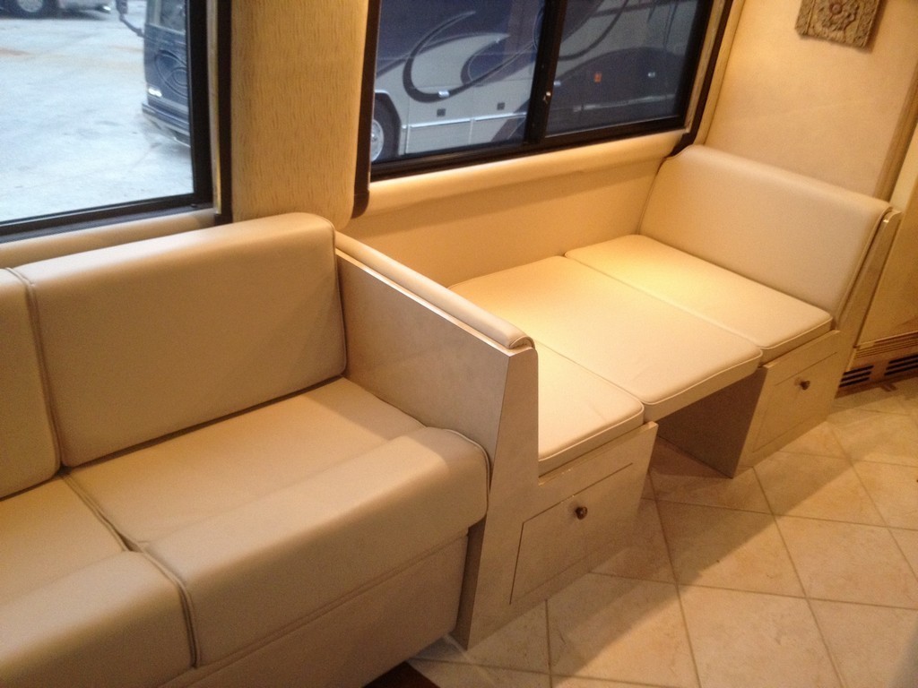 Prevost H3-45 new Sofa and Facing Dinette by Excalibur Coach