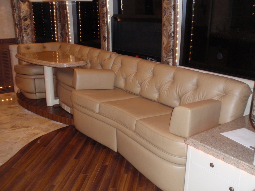 Prevost Motorhomes - New Floor with newly upholstered sofa by Excalibur