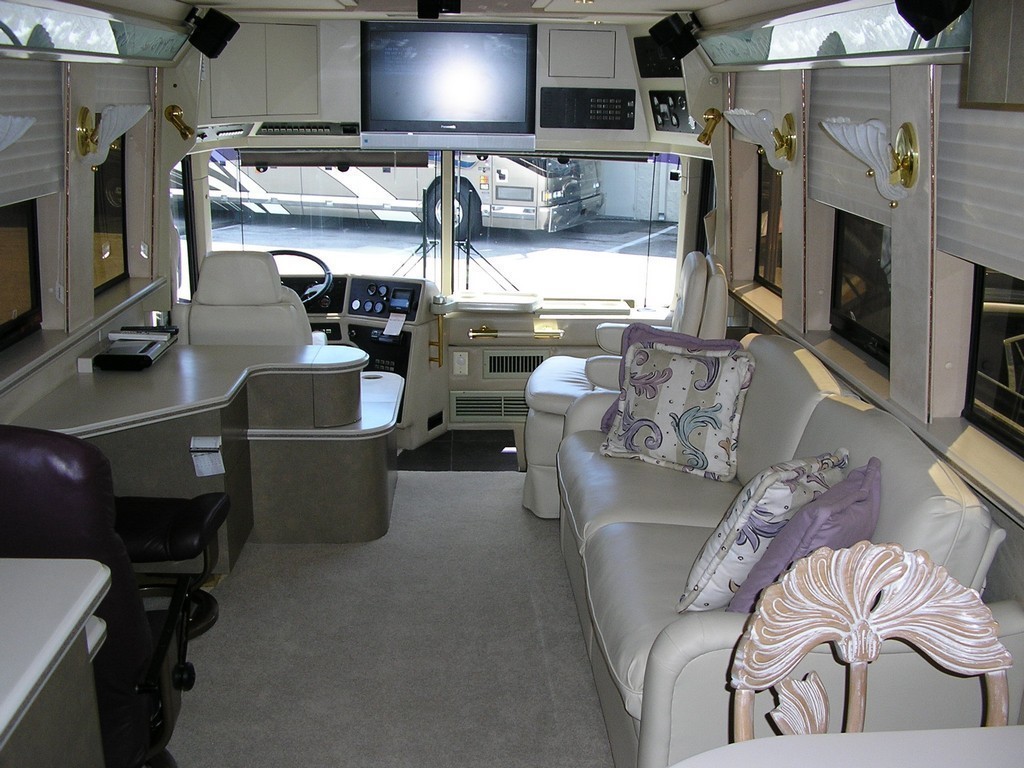 New upholstered salon sofa by Excalibur - Prevost Motorhome Coach