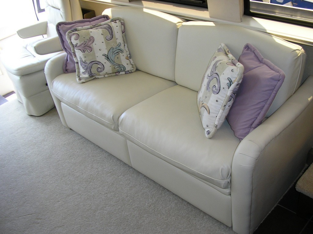 New upholstery on salon sofa by Excalibur - Prevost motorhome coach