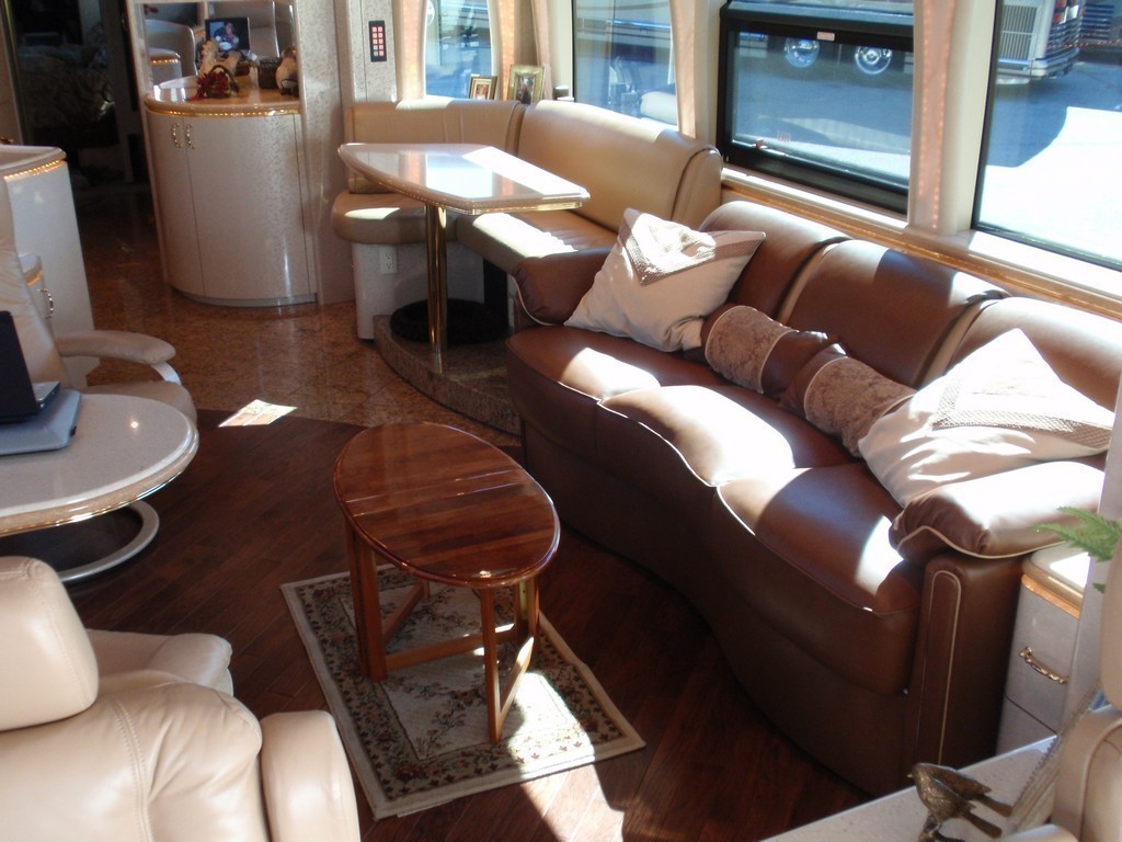 New upholstery on sofa by Excalibur Marathon XL II Motorhome